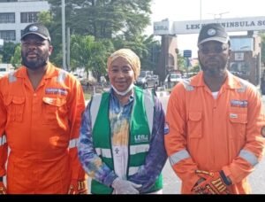 From Left: Special Adviser to Lagos State Gov. Babjide Sanwo-Olu on Tourism, Arts and Culture, Mr Idris Aregbe; Lekki Resident Association Chairman, Mrs Shareefah Andu and Senior Assistant to Sanwo-Olu on Transport and Logistics, Mr Adekoya Hassan at the environmental sanitation in Lekki on Saturday