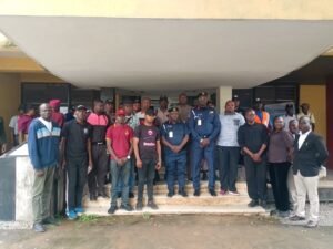 DCC Timothy Patuola (Middle left)and DCC Akintayo Akande,NSCDC Head of Department, Private Guard Companies (PGC) in Oyo State and PGCs at a training organised by the Command for PGCs in the state on Thursday in Ibadan.