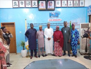 The Managing Director (middle), out going Editor -in - Chief left and other members of the editorial unit