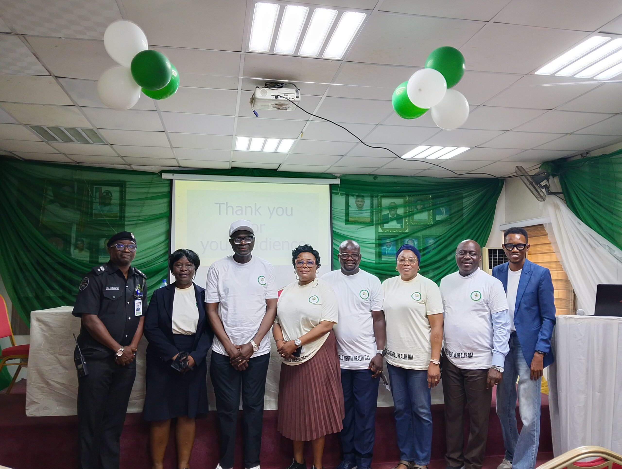 Dr Olugbenga Owoeye, Medical Director, Federal Neuropsychiatric Hospital Yaba (middle) with dignitaries at a lecture to World Mental Health Day at the hospital on Monday in Lagos